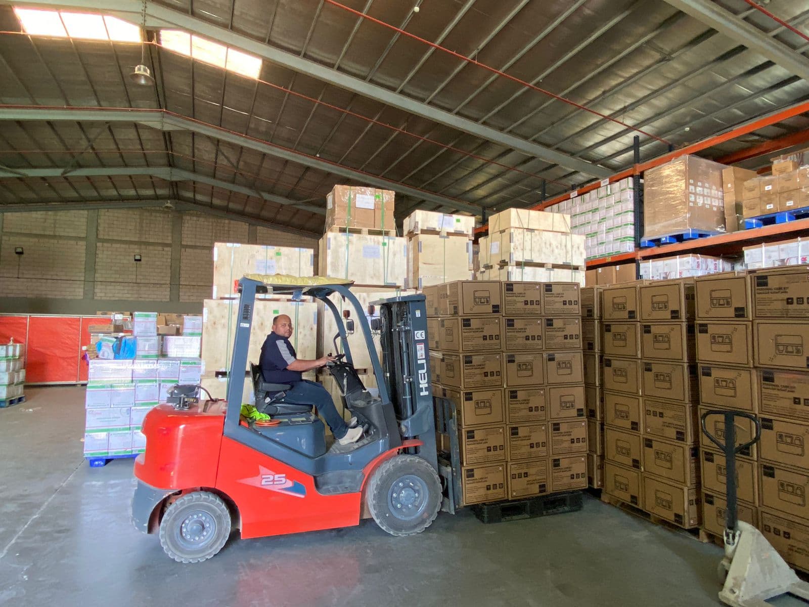 Forklift handling service inside Excellence Logistics warehouse in Riyadh